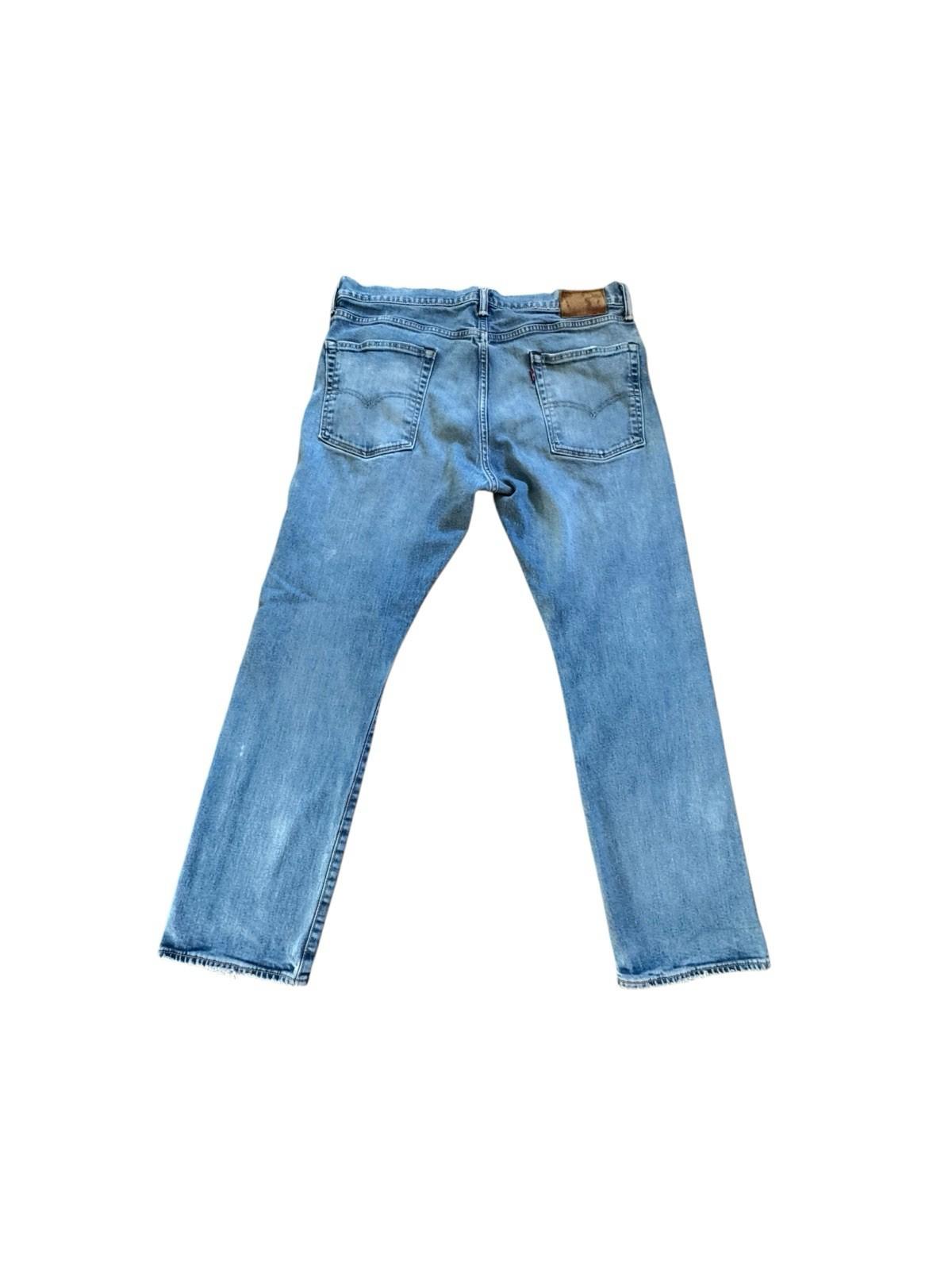 Levis 513 Blue Jeans Size 36 x 30 Denim With Tear