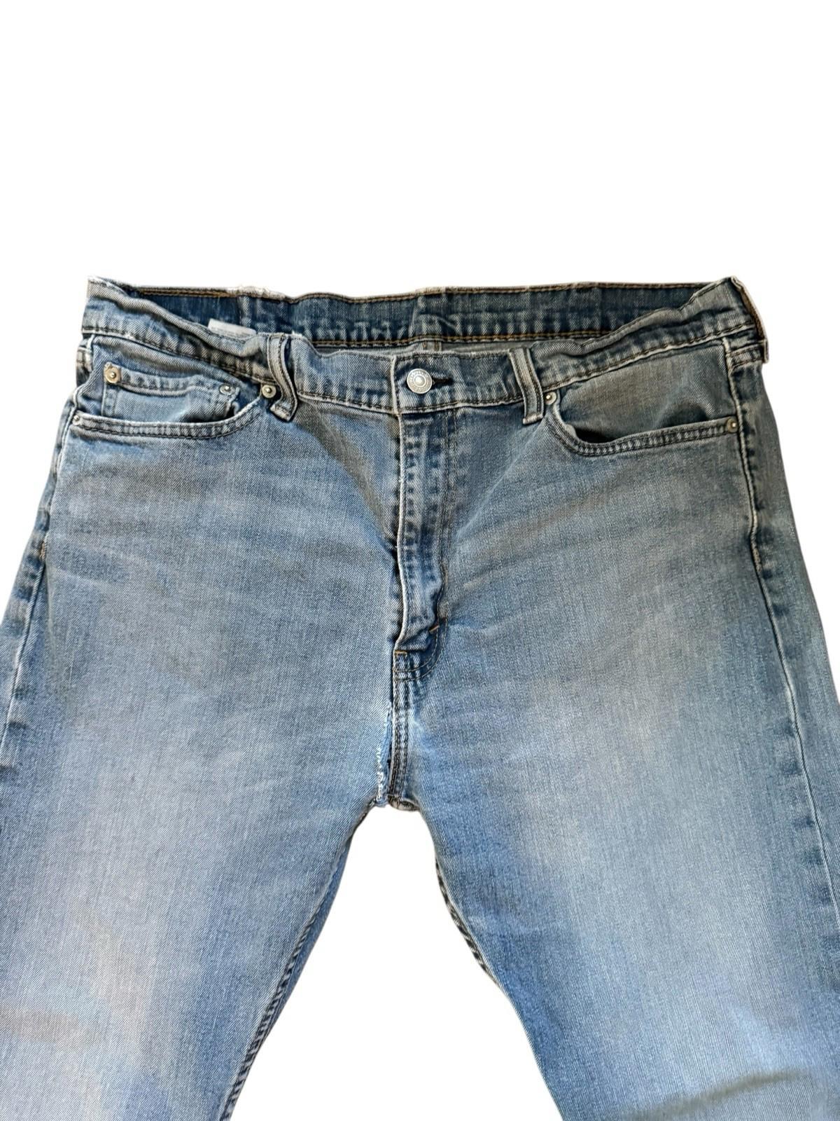 Levis 513 Blue Jeans Size 38 x 30 Denim Well Worn And Soft With Tear